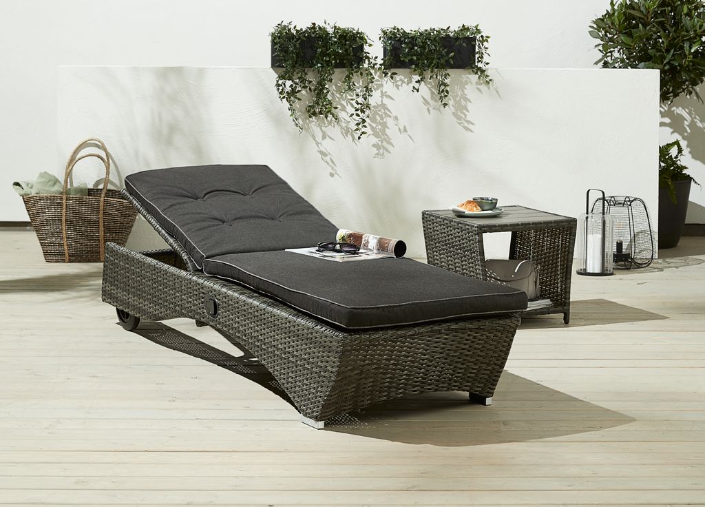 Tumbona de jardín gris con cojín